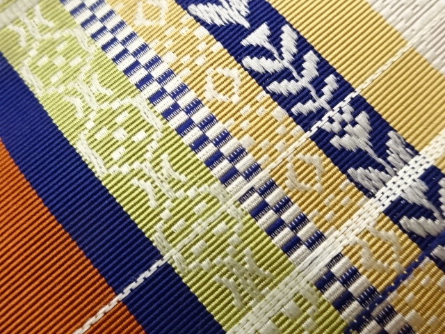  本場筑前博多変わり格子に幾何学模様織出し名古屋帯